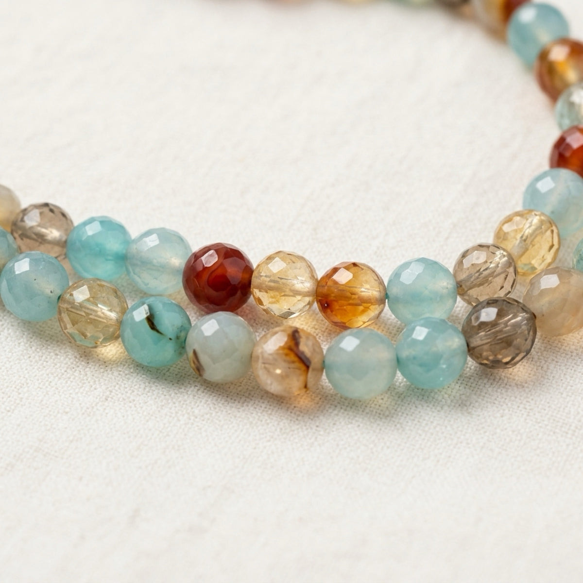 Blues Phone Chain — faceted semi-precious stone phone chain in blue, seafoam, and aqua tones